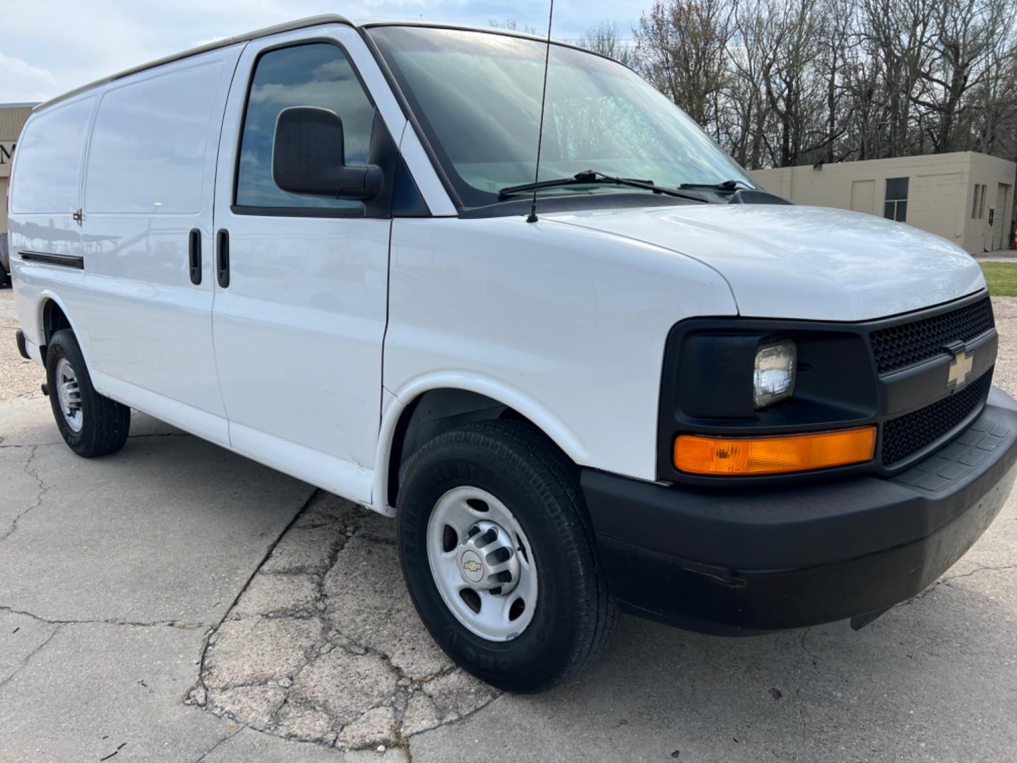 2013 White /Gray Chevrolet Express (1GCWGFCA0D1) with an 4.8 V8 engine, Automatic transmission, located at 4520 Airline Hwy, Baton Rouge, LA, 70805, (225) 357-1497, 30.509325, -91.145432 - 2013 Chevy Express 2500 Cargo Van 4.8 V8 Gas, 250K Miles, Power Windows & Locks. NO IN HOUSE FINANCING. FOR INFO PLEASE CONTACT JEFF AT 225 357-1497 CHECK OUT OUR A+ RATING WITH THE BETTER BUSINESS BUREAU WE HAVE BEEN A FAMILY OWNED AND OPERATED BUSINESS AT THE SAME LOCATION FOR OVER 45 YEARS. WE S - Photo#3